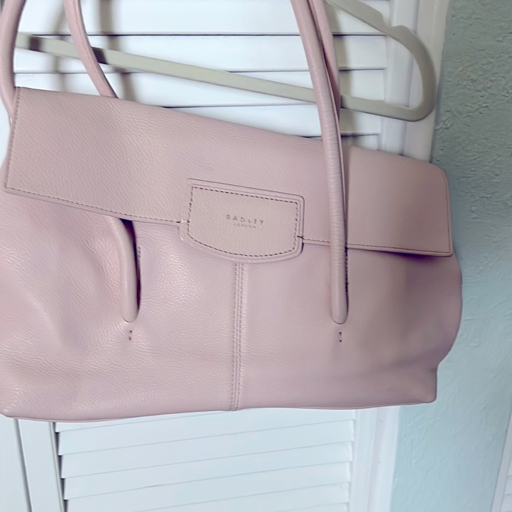 Radley, London handbag in blush pink. Pockets galore, magnetic closure. Like new